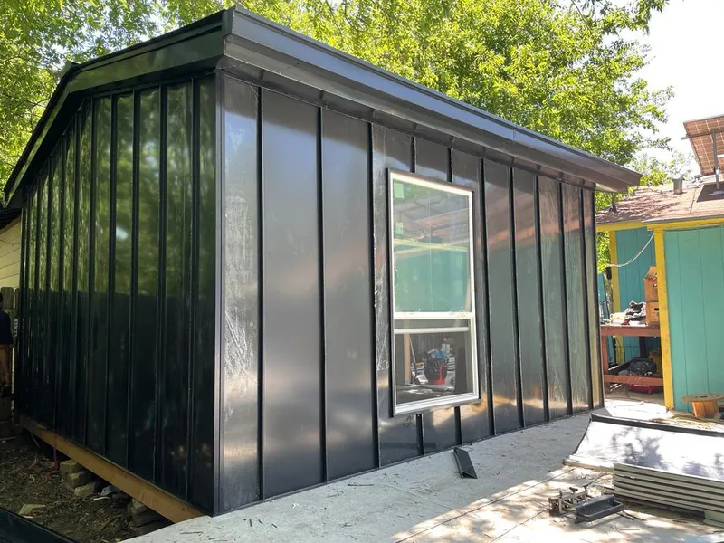 Black standing seam metal wall panels for Roof Inspection in Mechanicsville